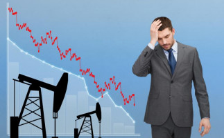 Padající ceny ropy by mohly zničit banky, které drží biliony dolarů v komoditních derivátech